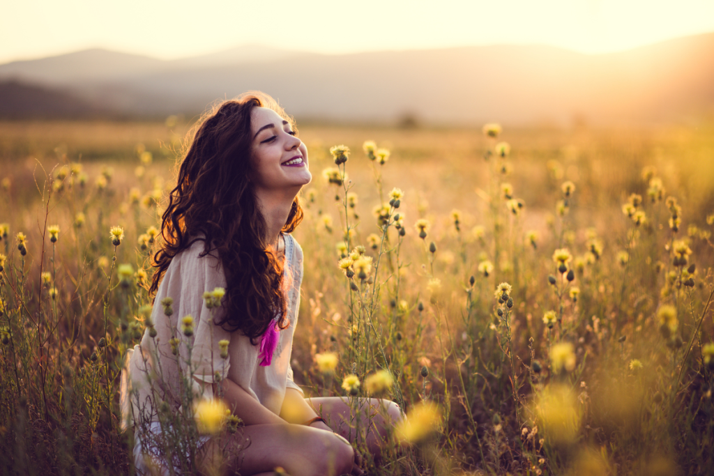 girl in nature with mushroom